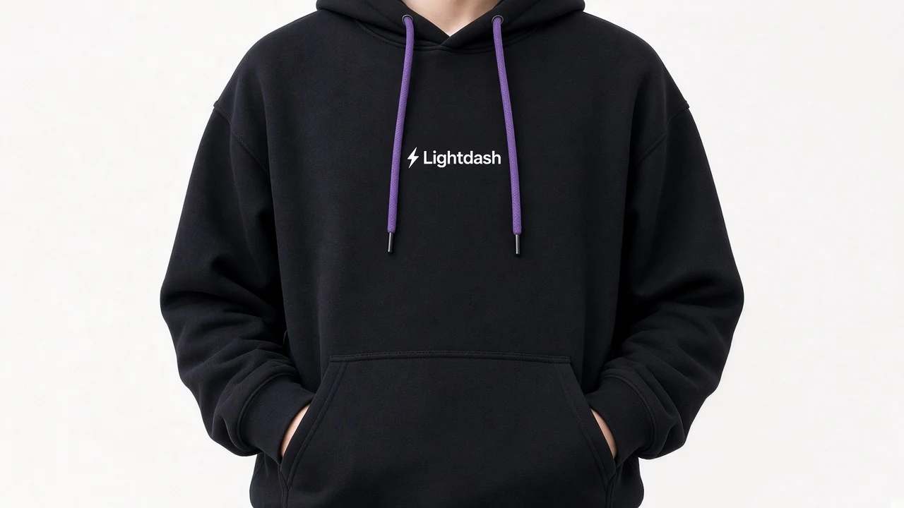 A person in a black hoodie with a small white Lightdash wordmark on the chest and purple drawstrings